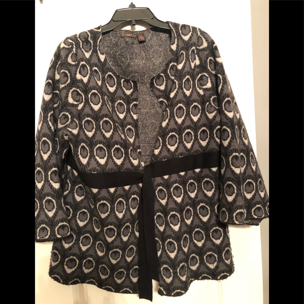 Tie front sweater with bell sleeves.